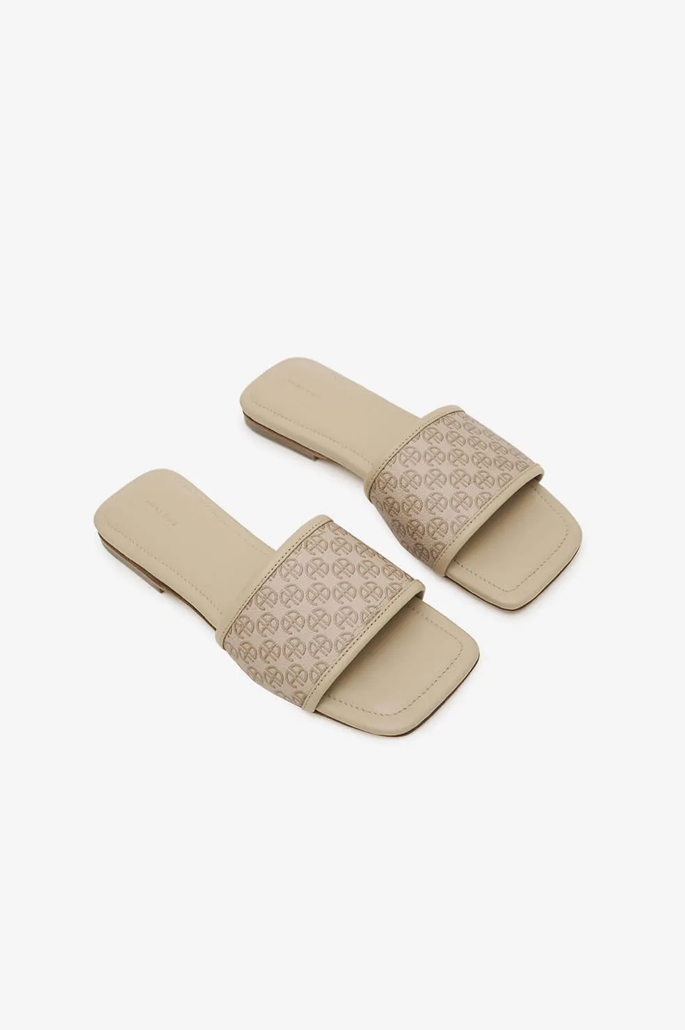Anine Bing - Ria Slides in Beige Monogram Print